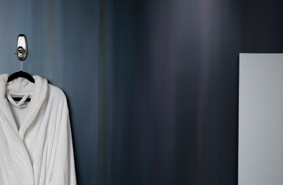 M9421 Dark Rolled Steel hotel suite bathroom with robe